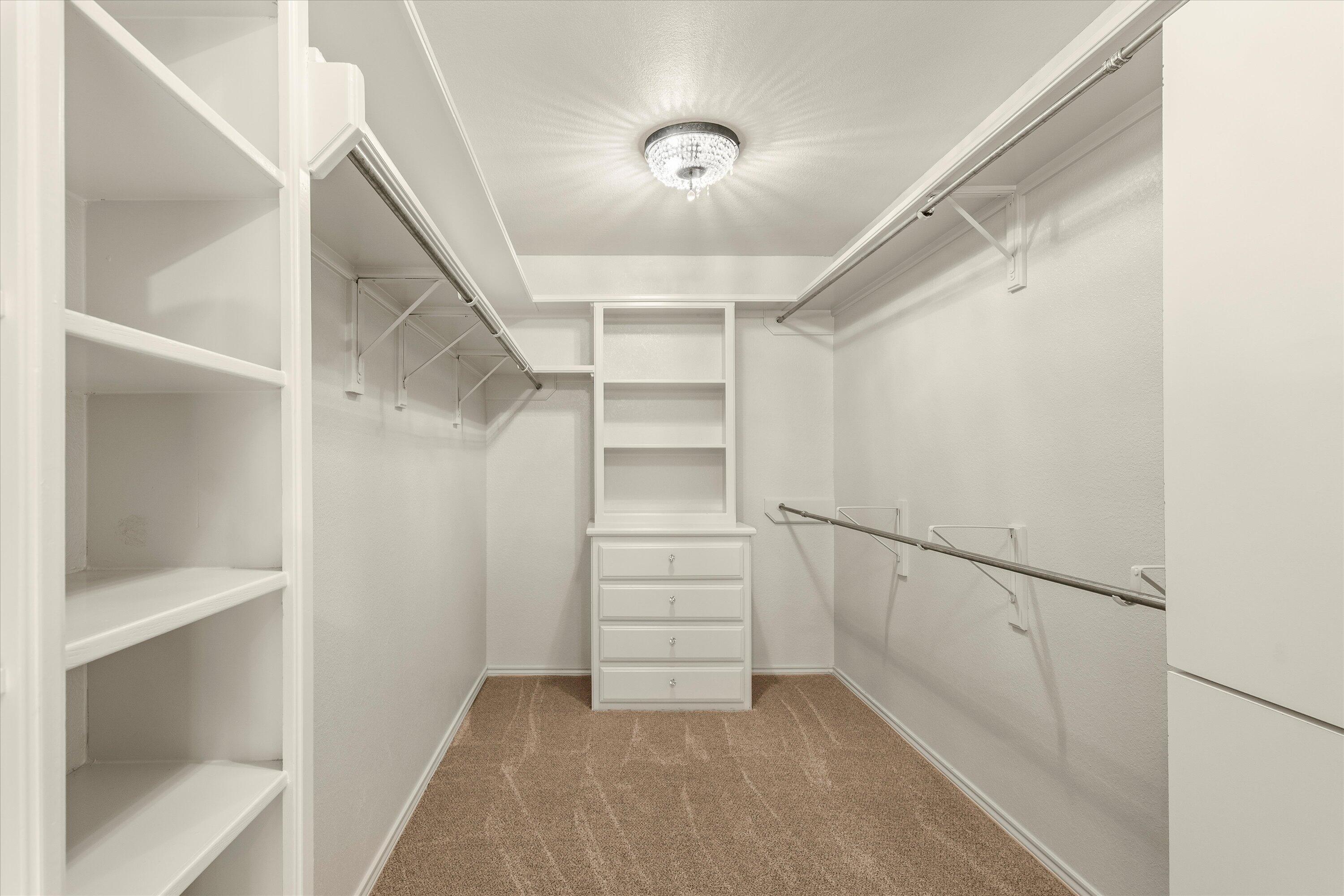 5110 96th Street Lubbock, TX 79424 - Photo 27 of 50 a view of an empty walk in closet