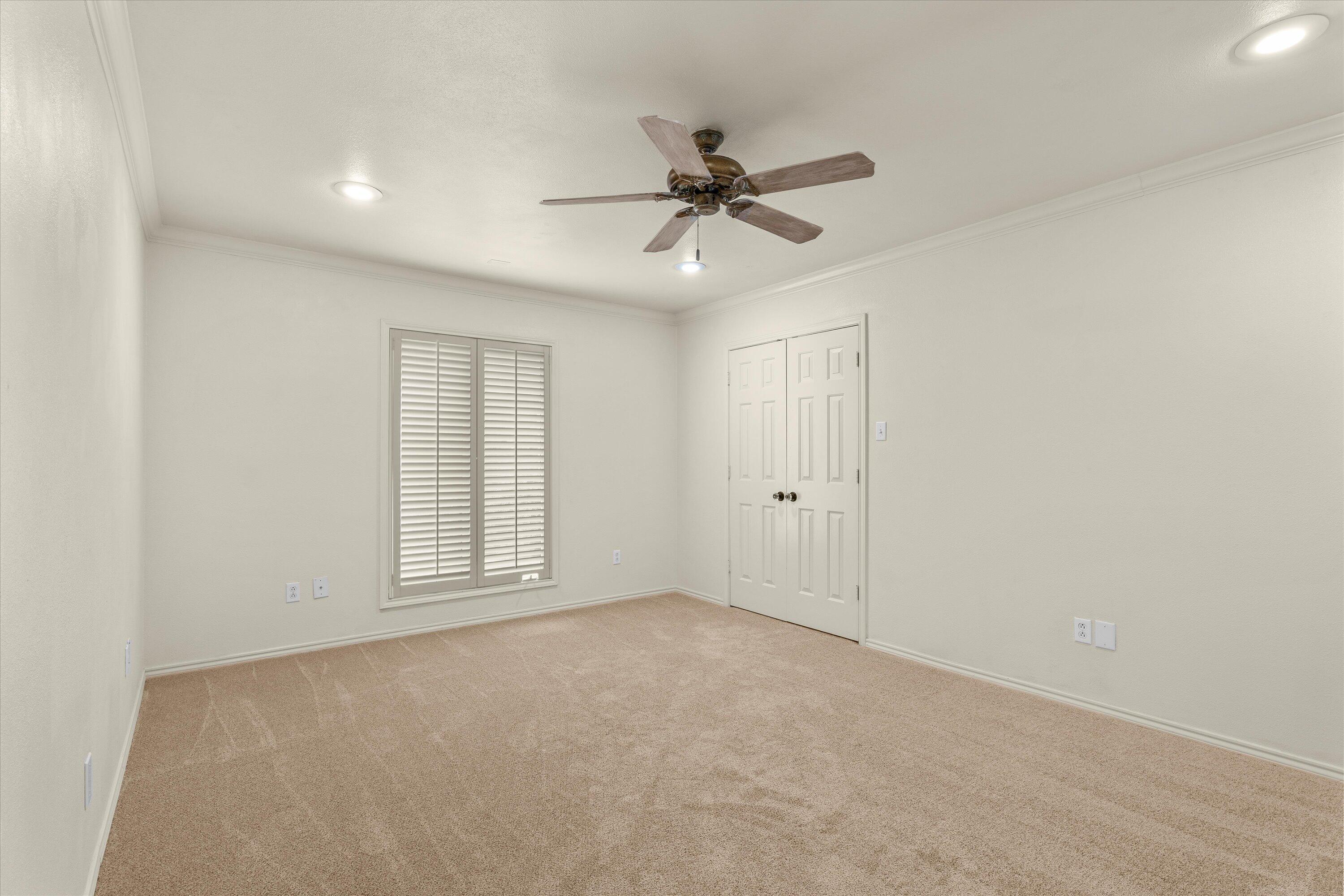 5110 96th Street Lubbock, TX 79424 - Photo 32 of 50 a view of an empty room with a window