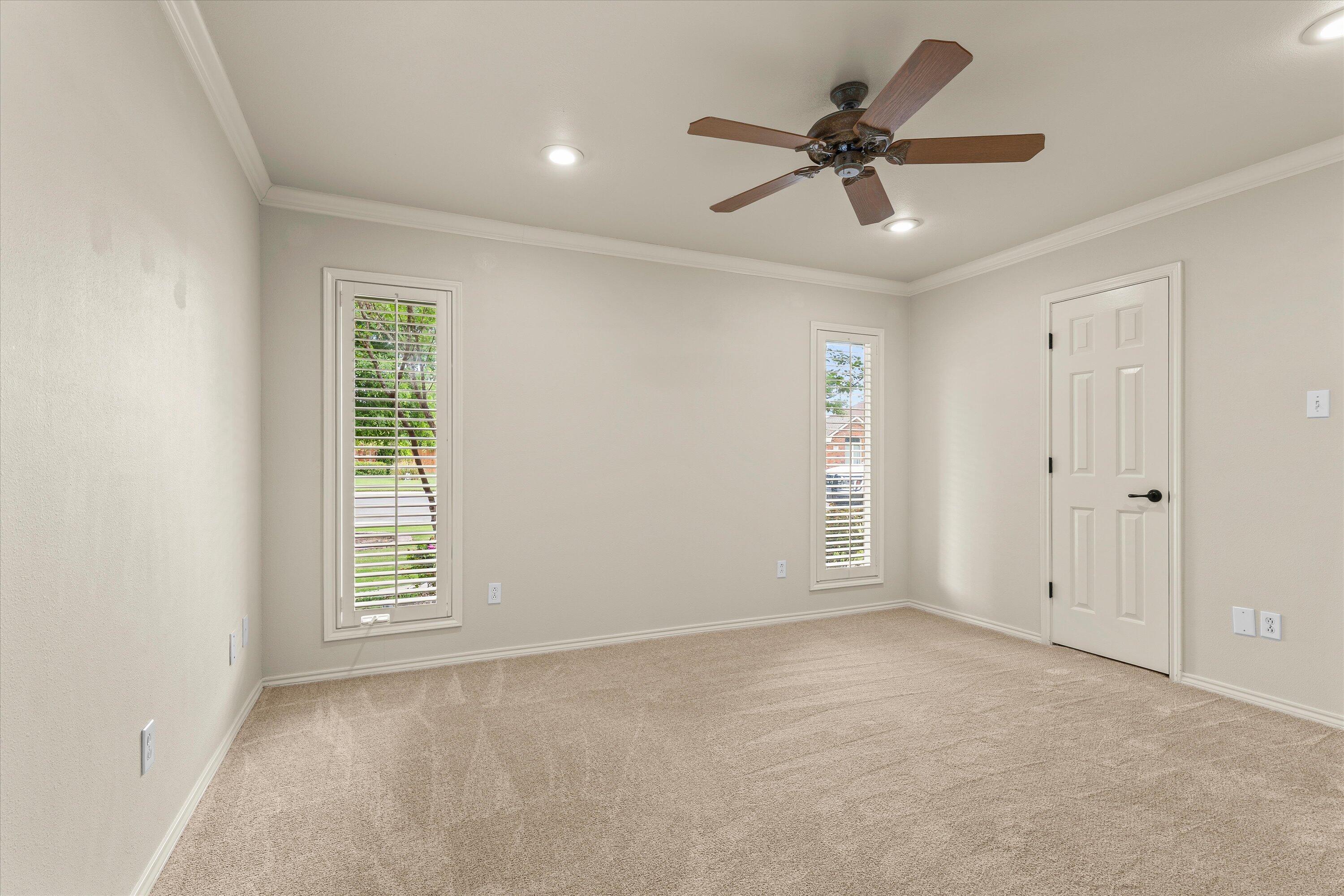 5110 96th Street Lubbock, TX 79424 - Photo 36 of 50 a view of an empty room with a window