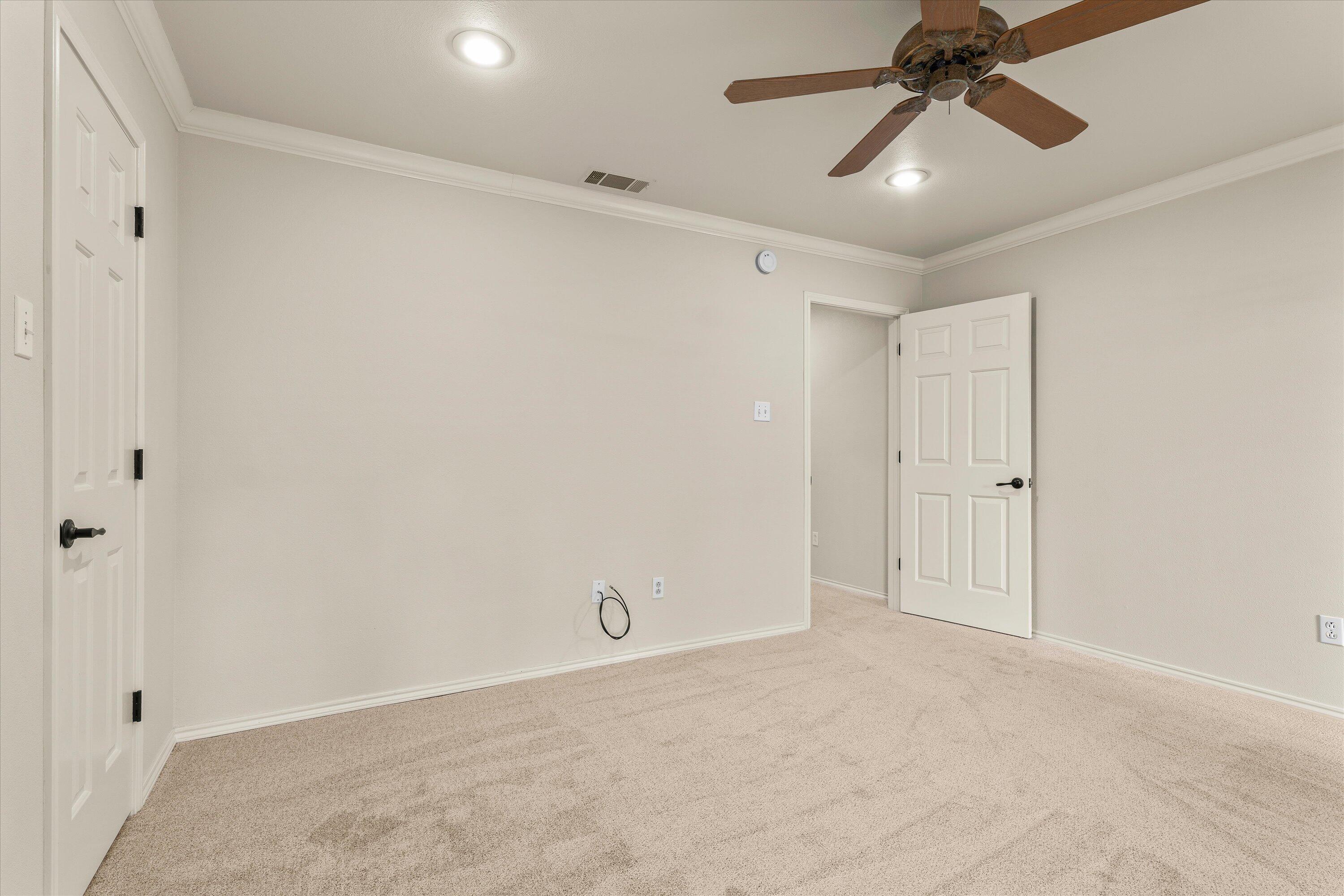 5110 96th Street Lubbock, TX 79424 - Photo 37 of 50 an empty room with ceiling fan