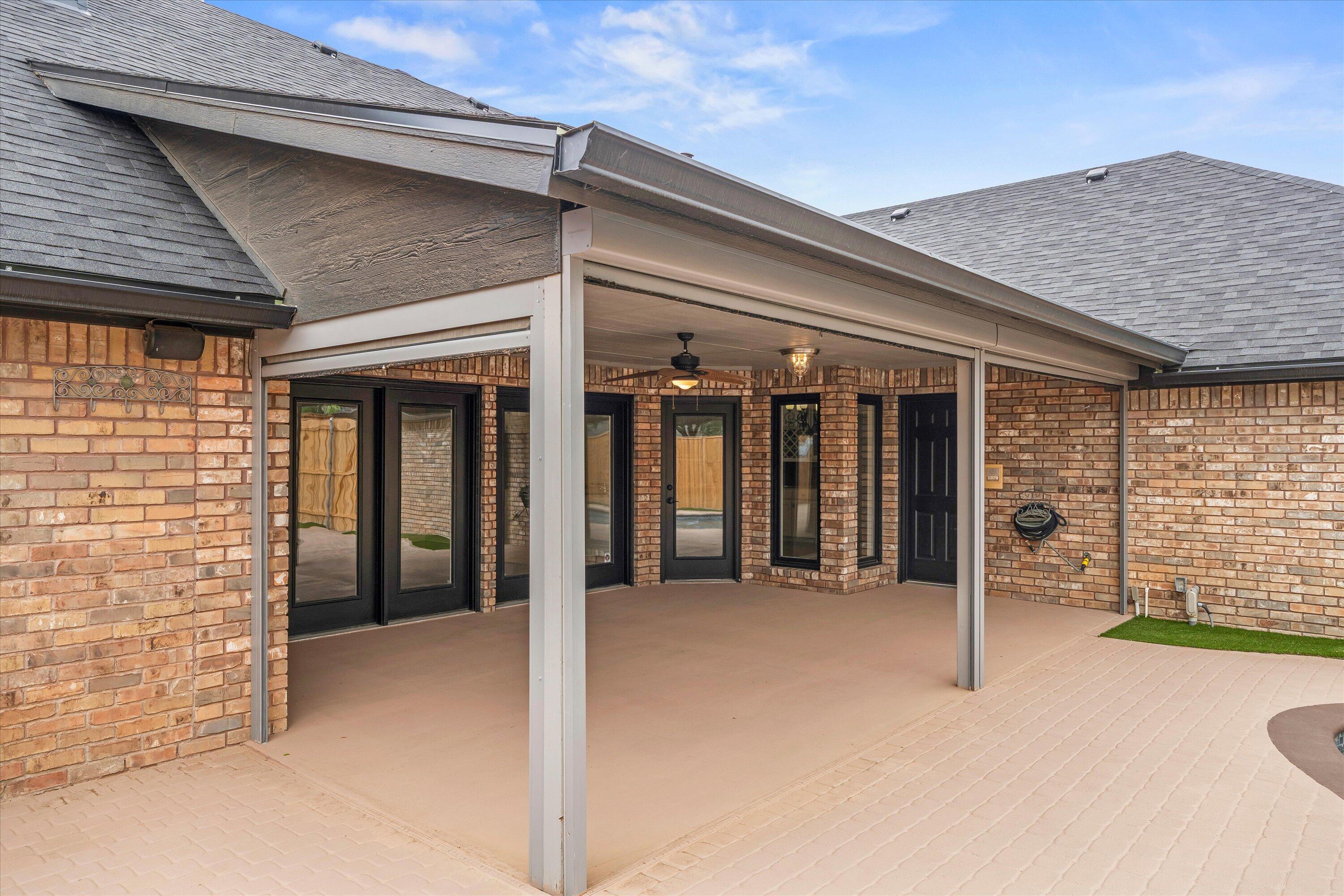 5110 96th Street Lubbock, TX 79424 - Photo 42 of 50 a view of a patio with table and chairs