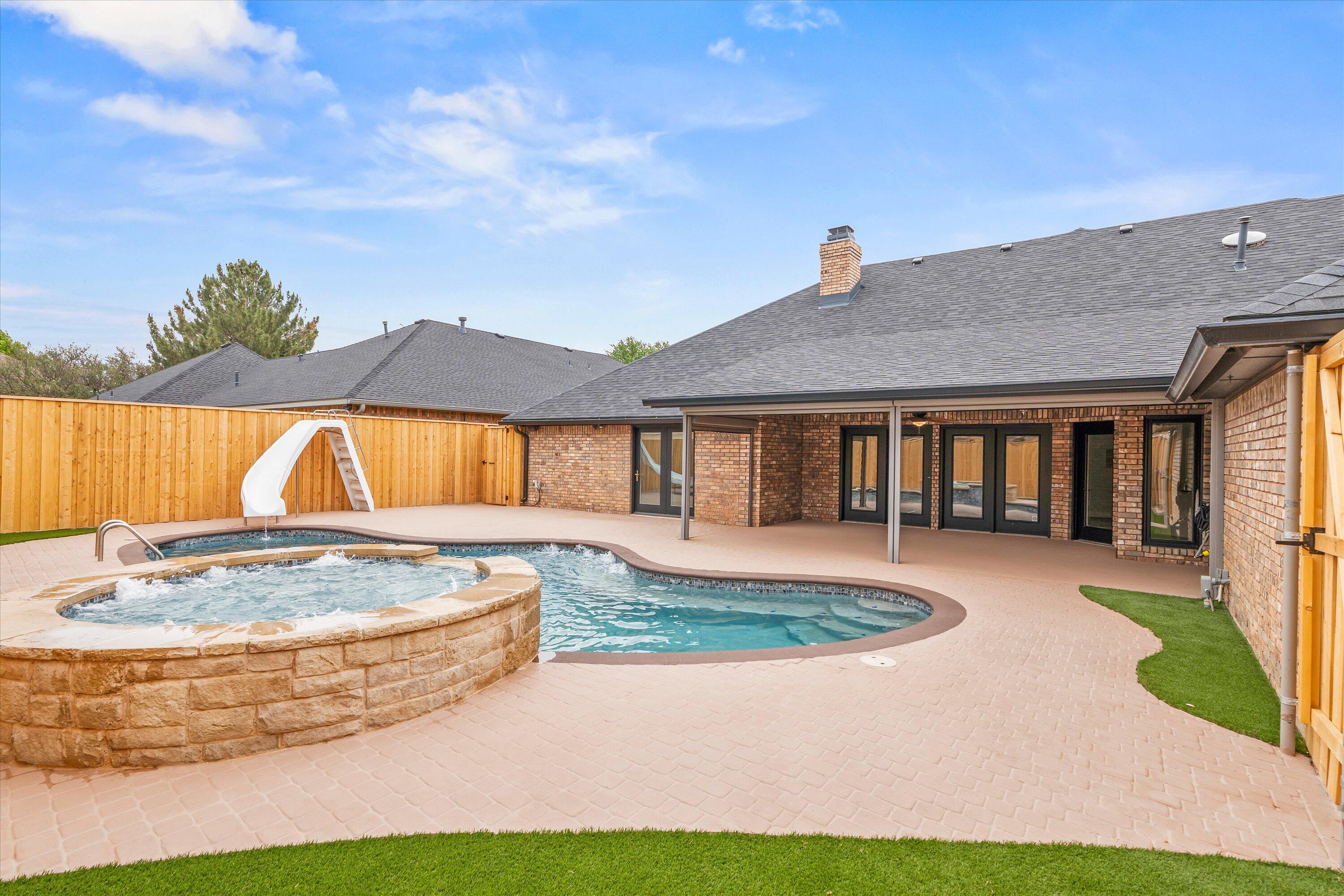 5110 96th Street Lubbock, TX 79424 - Photo 48 of 50 a view of outdoor space yard and swimming pool