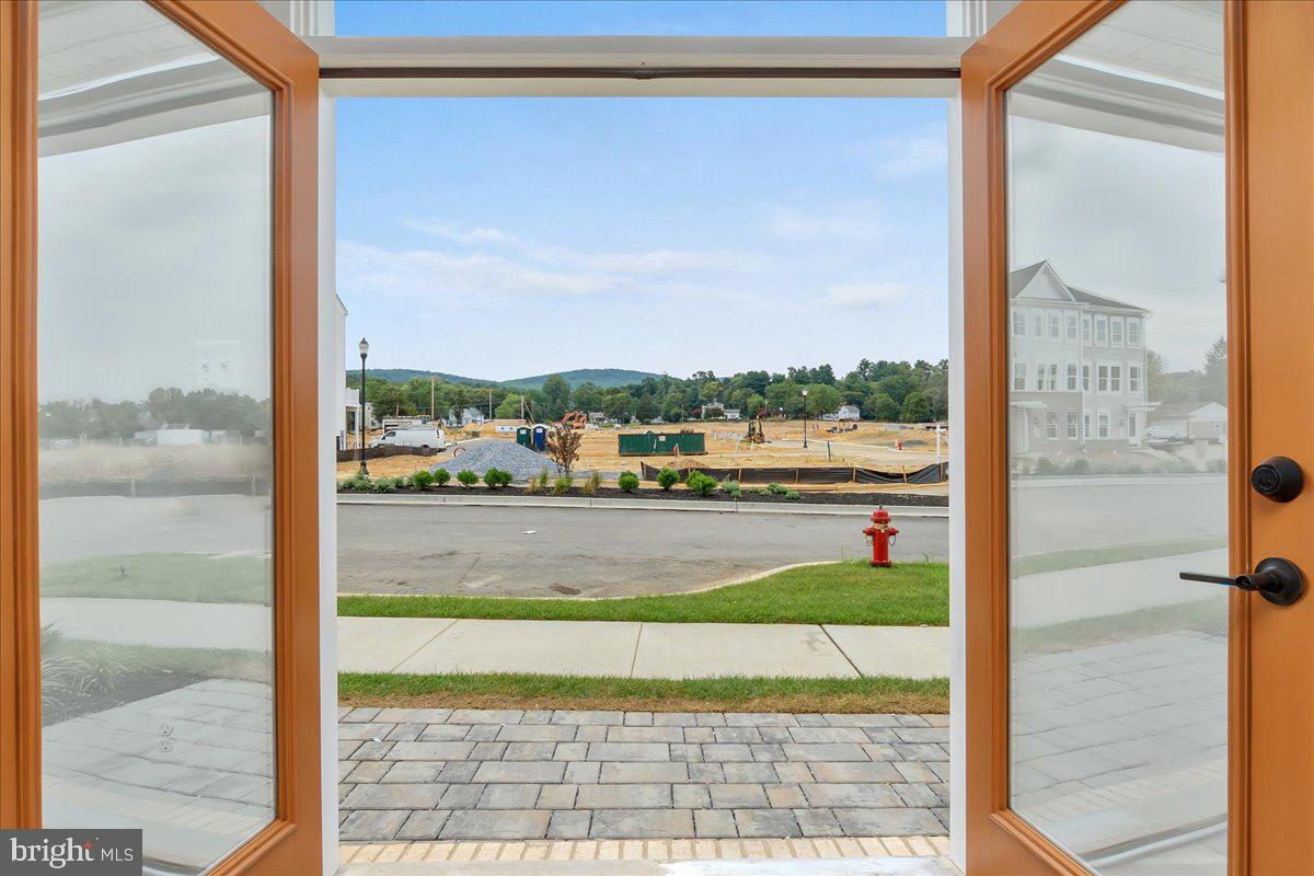 722 Iron Frg Road, Unit 218 Frederick, MD 21702 - Photo 11 of 42 French doors open onto owner's patio.