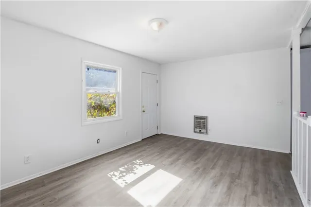 an empty room with window