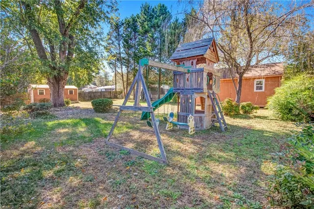 a view of a park with a slide