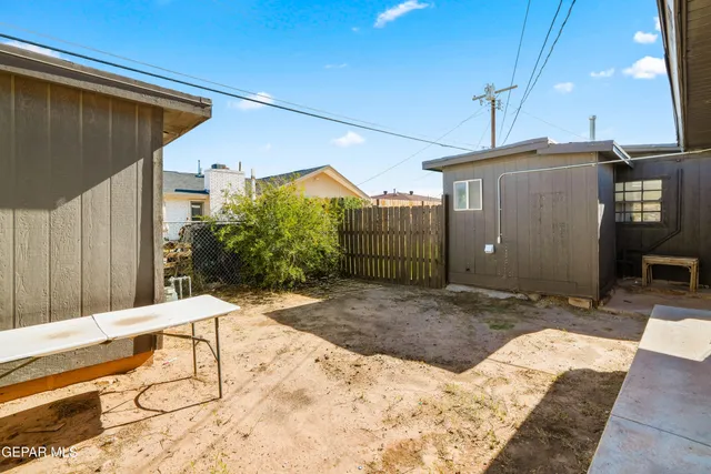 a view of a house with outdoor space and sitting area