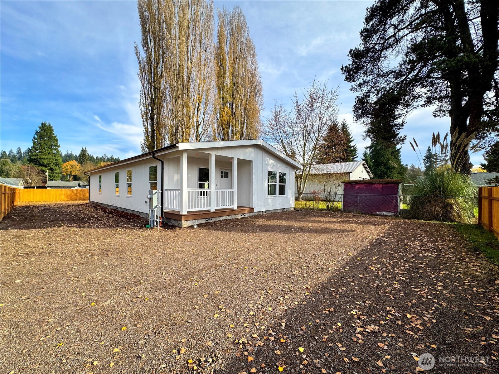 3060 Pennsylvania Street Longview, WA 98632 - Photo 14 of 14 a view of a house with backyard and trees