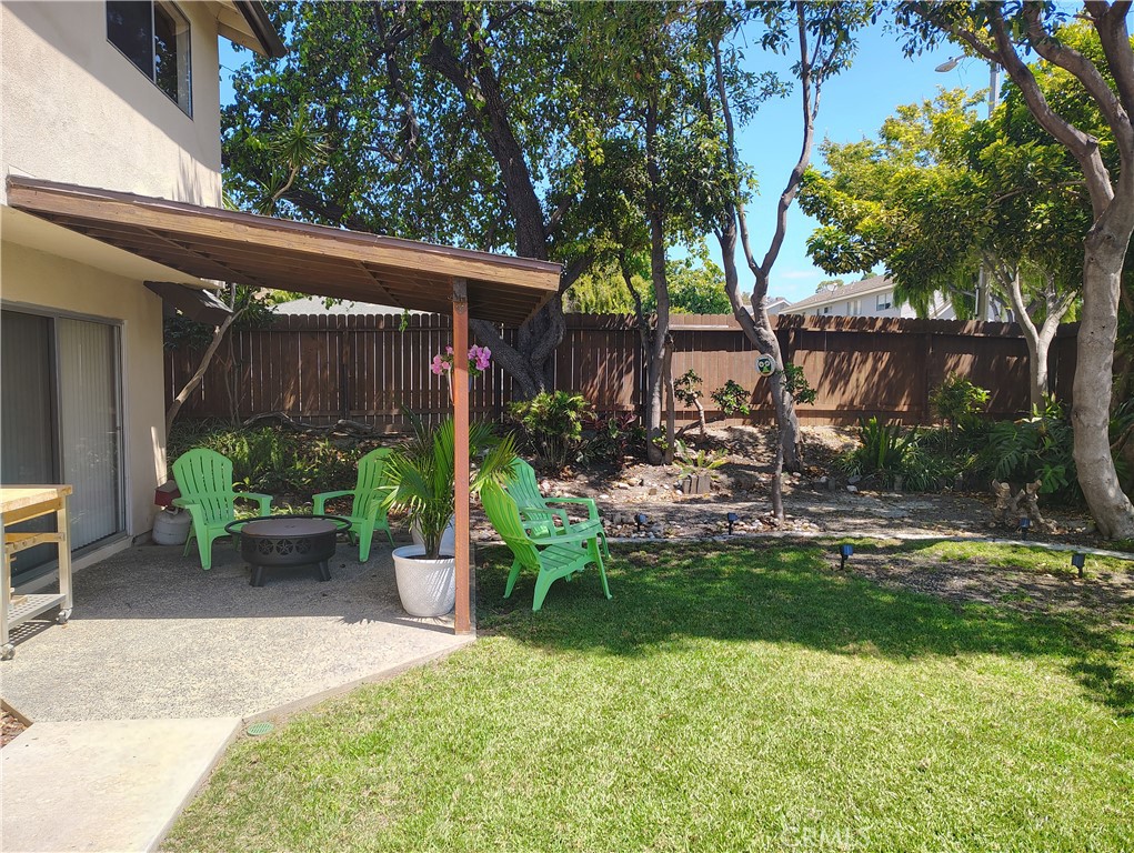 398 Day Road Ventura, CA 93003 - Photo 56 of 69 a view of a chair and table in backyard of the house