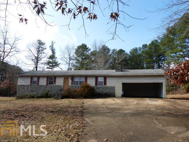 69 Patterson Road, Unit 15 Griffin, GA 30223 - Photo 1 of 1 a front view of a house with a yard