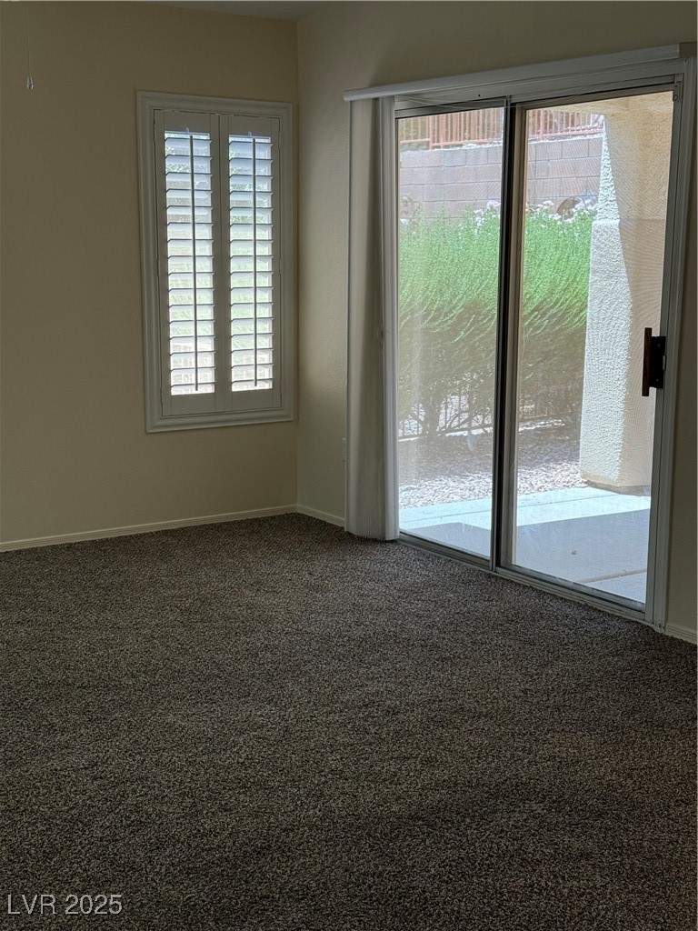 495 Edgefield Ridge Place Henderson, NV 89012 - Photo 6 of 16 Spare room featuring carpet and baseboards