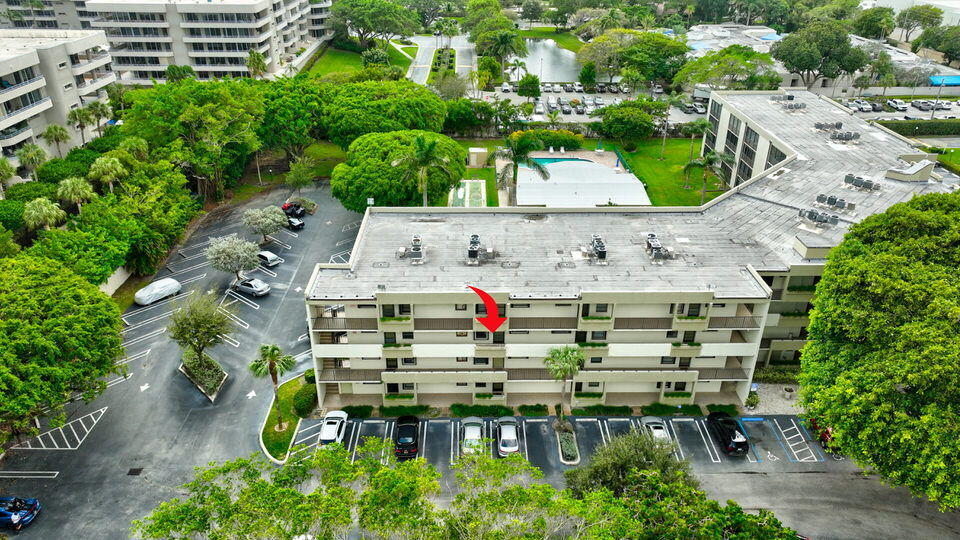 555 Banyan Tree Lane, Unit 302 Delray Beach, FL 33483 - Photo 19 of 69 an aerial view of a house with outdoor space