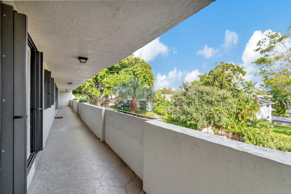 555 Banyan Tree Lane, Unit 302 Delray Beach, FL 33483 - Photo 3 of 69 a view of a balcony