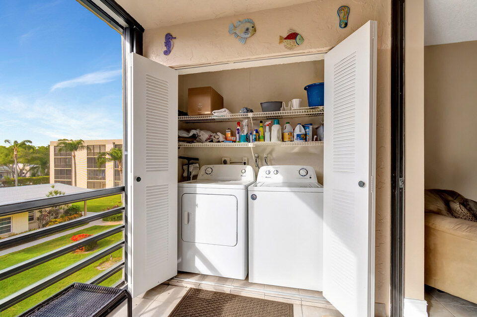555 Banyan Tree Lane, Unit 302 Delray Beach, FL 33483 - Photo 62 of 69 a room with storage and utility