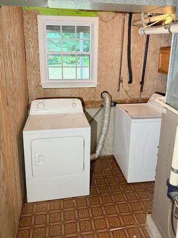 a utility room with a washer and dryer