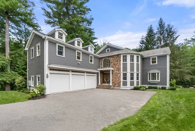 a view of a living room and a livingroom with furniture stairs