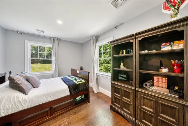 a bathroom with a sink double vanity and a mirror