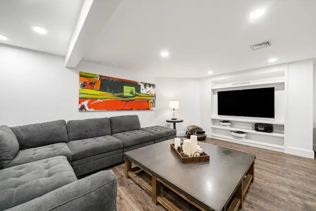 a view of a living room and kitchen