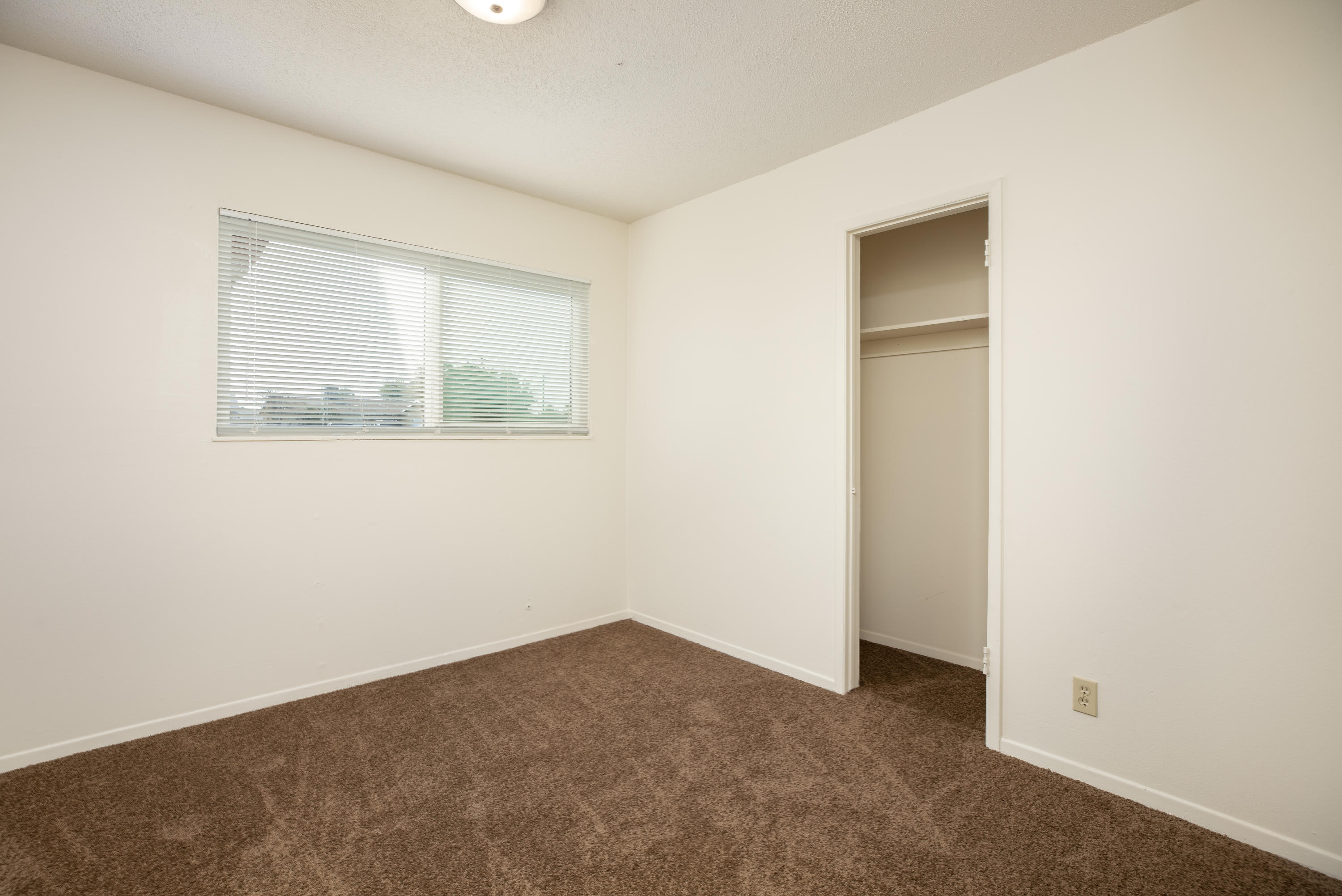248 North Norma Street Ridgecrest, CA 93555 - Photo 8 of 17 an empty room with a window
