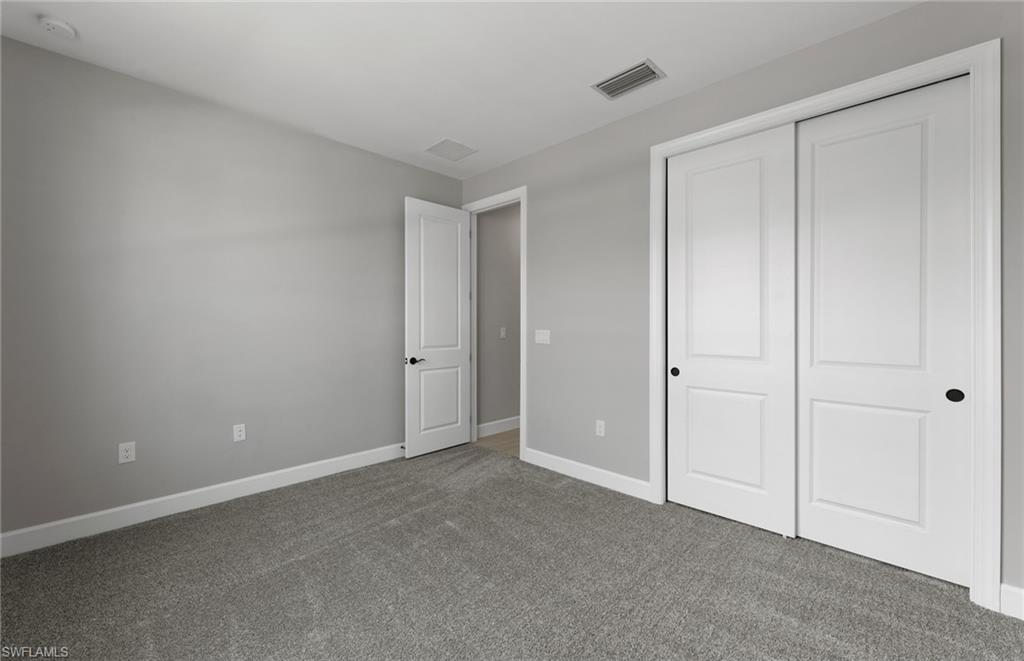 42533 Little Ridge Road Punta Gorda, FL 33982 - Photo 17 of 50 a view of an empty room and closet area