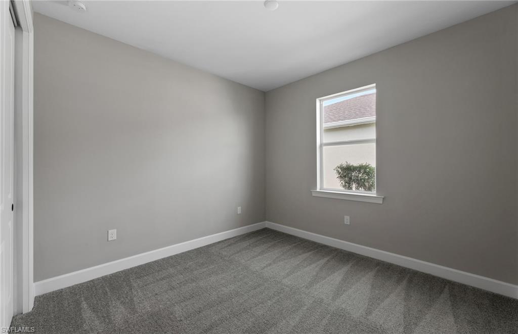 42533 Little Ridge Road Punta Gorda, FL 33982 - Photo 19 of 50 an empty room with windows