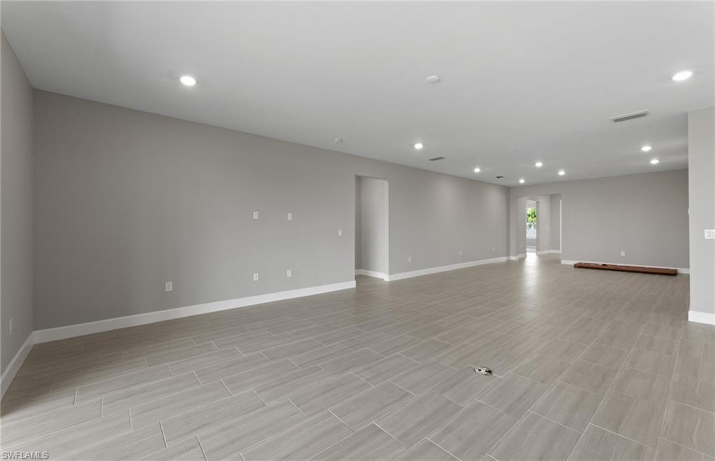42533 Little Ridge Road Punta Gorda, FL 33982 - Photo 25 of 50 a view of an empty room with wooden floor