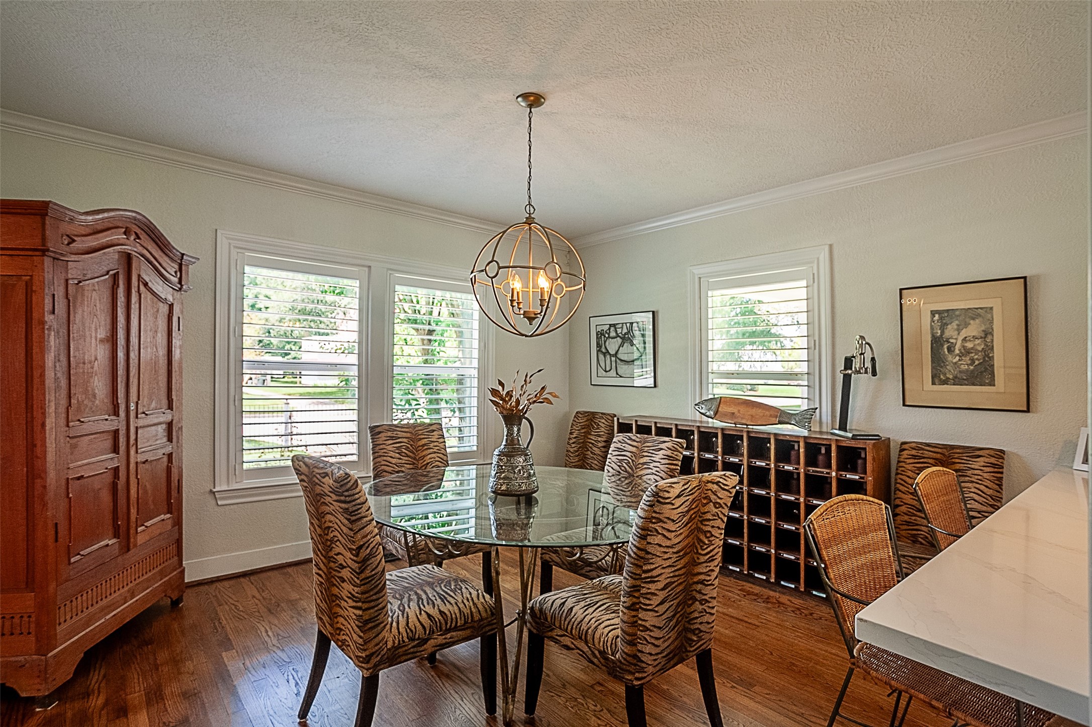 260 Manor Street Beaumont, TX 77706 - Photo 13 of 50 a view of a dining room with furniture window and wooden floor