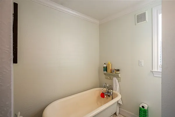 a bathroom with a toilet and sink