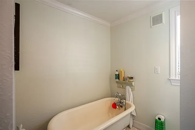 a bathroom with a toilet and sink