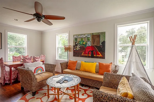 a living room with furniture and a window