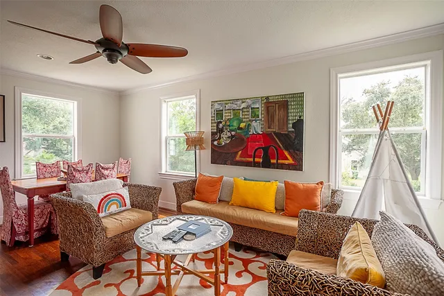 a living room with furniture and a window