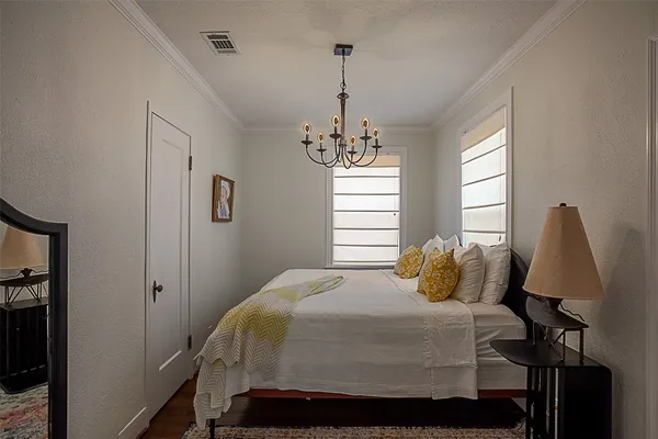 a view of hallway with wooden floor