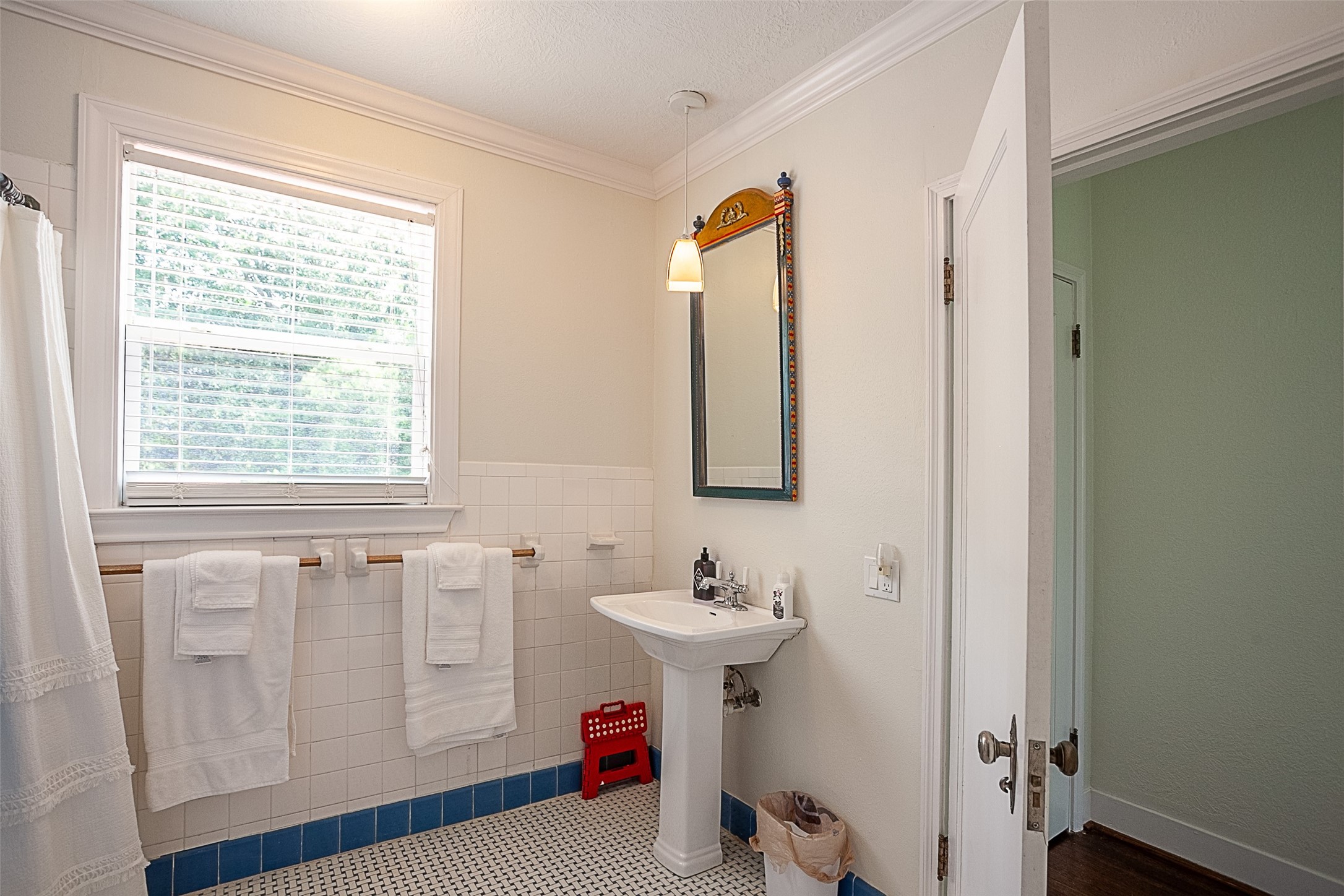 260 Manor Street Beaumont, TX 77706 - Photo 42 of 50 a bathroom with a sink and a mirror
