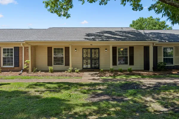 a view of a house with a patio