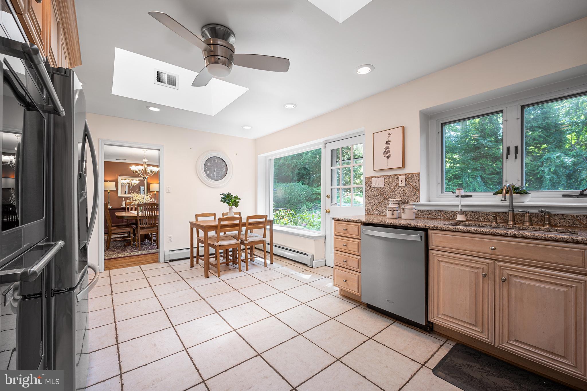612 Manayunk Road Merion Station, PA 19066 - Photo 20 of 48 a kitchen with stainless steel appliances kitchen island granite countertop a sink and cabinets