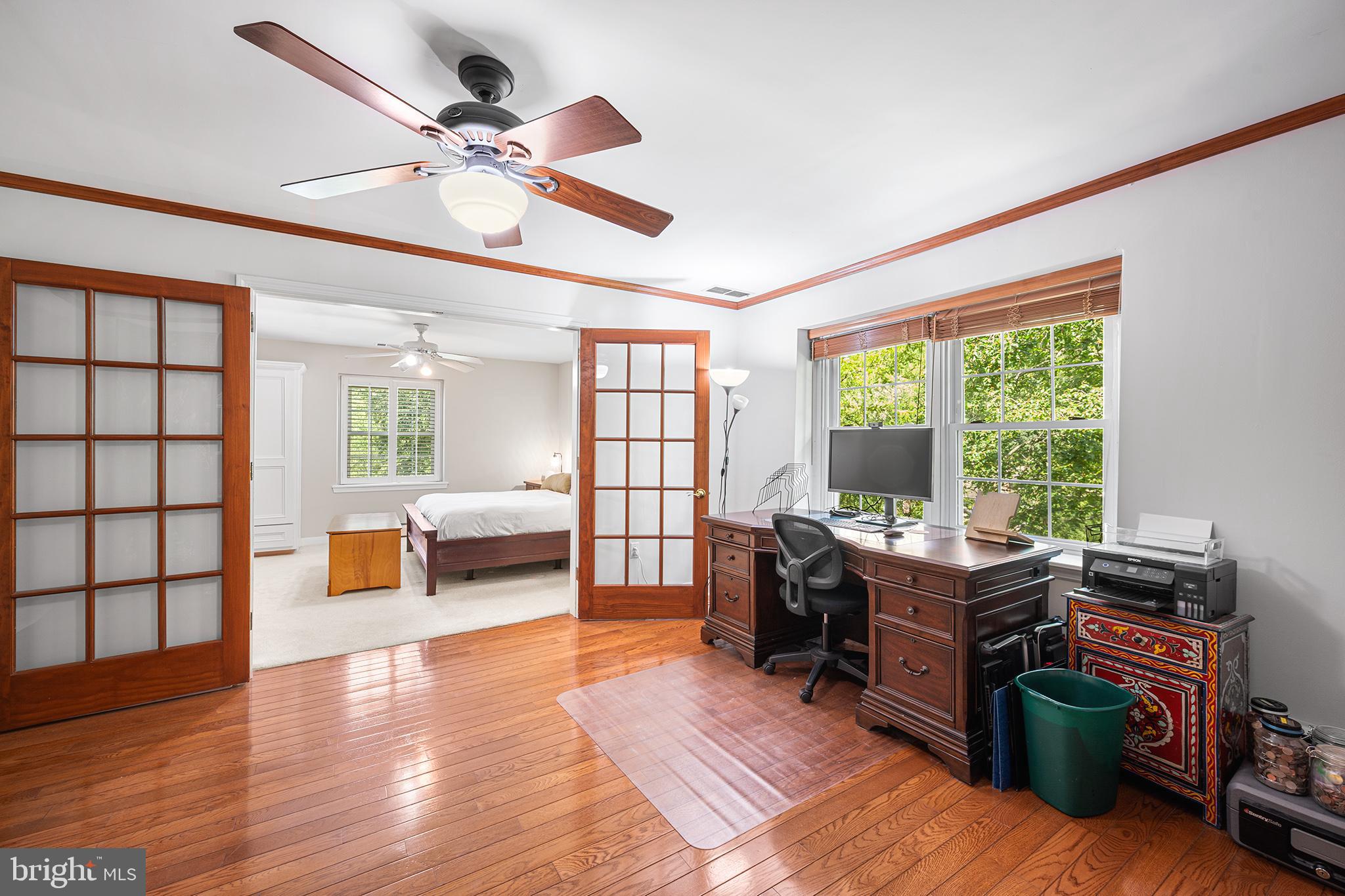 612 Manayunk Road Merion Station, PA 19066 - Photo 27 of 48 a view of a workspace with furniture and a window
