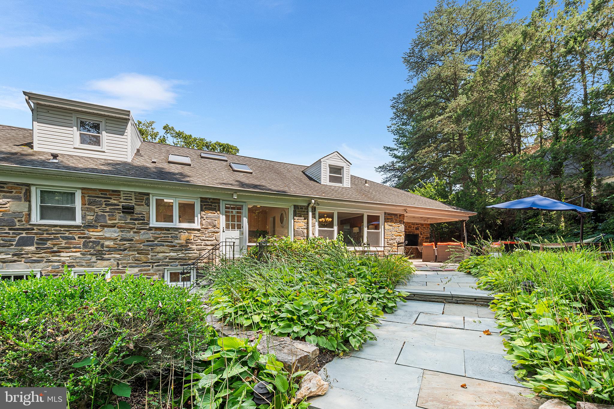 612 Manayunk Road Merion Station, PA 19066 - Photo 4 of 48 a front view of a house with a yard