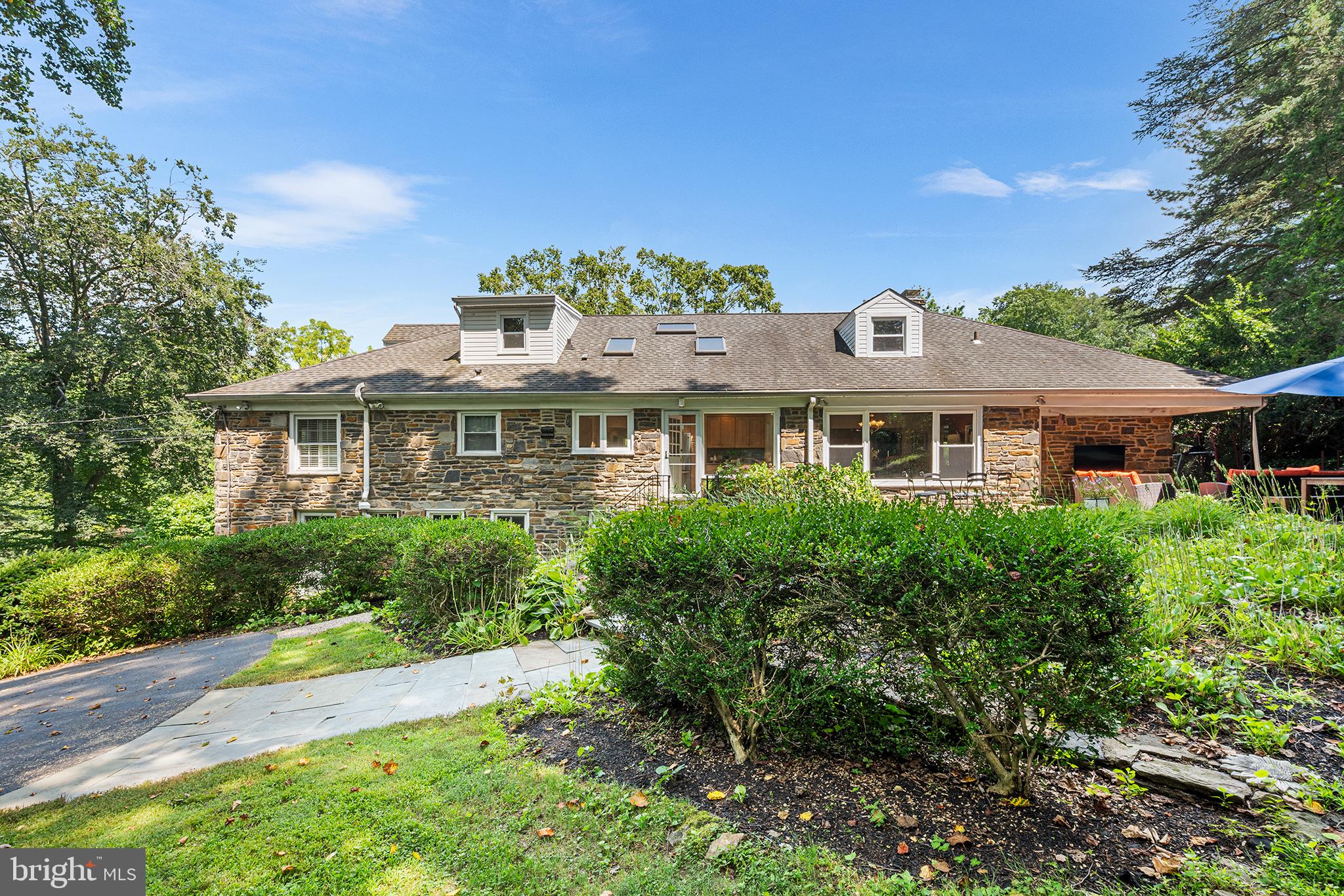 612 Manayunk Road Merion Station, PA 19066 - Photo 43 of 48 a front view of a house with a yard
