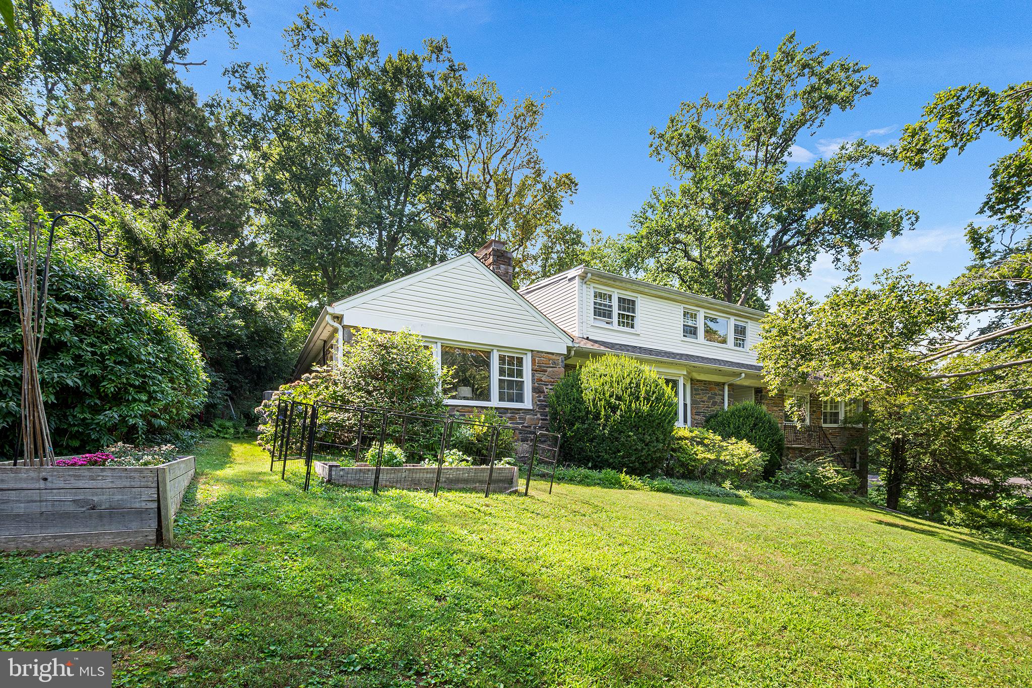 612 Manayunk Road Merion Station, PA 19066 - Photo 44 of 48 a front view of a house with a yard