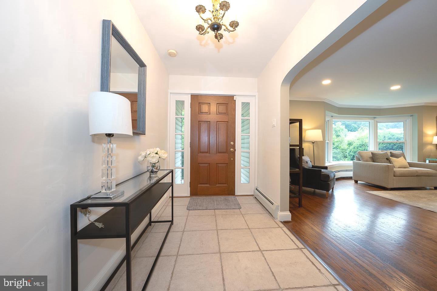 612 Manayunk Road Merion Station, PA 19066 - Photo 8 of 48 a living room with furniture and a window