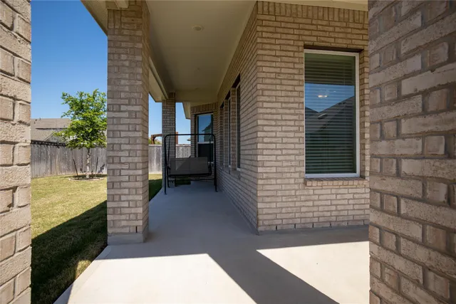 a view of a balcony with a door