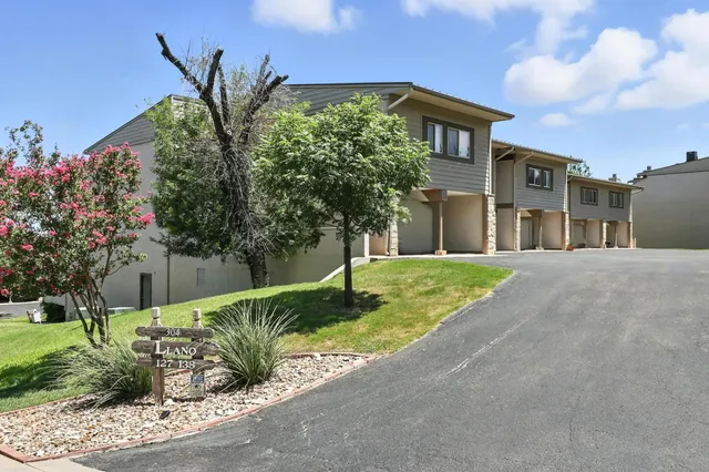 a house view with a garden space