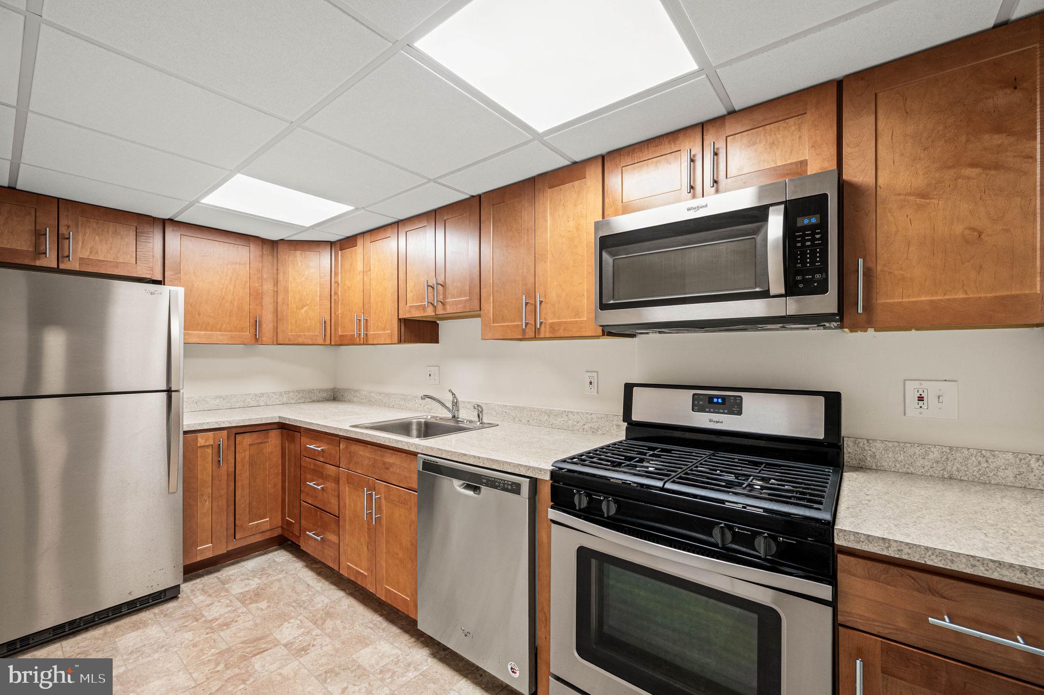 801 Yale Avenue, Unit 610 Swarthmore, PA 19081 - Photo 11 of 39 Kitchen with stainless steel appliances.
