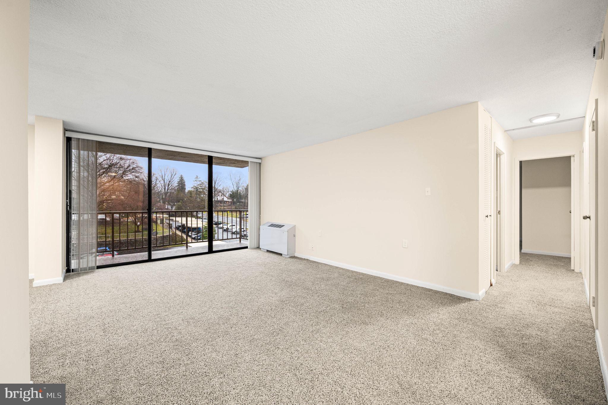 801 Yale Avenue, Unit 610 Swarthmore, PA 19081 - Photo 2 of 39 Living room looking out to balcony.