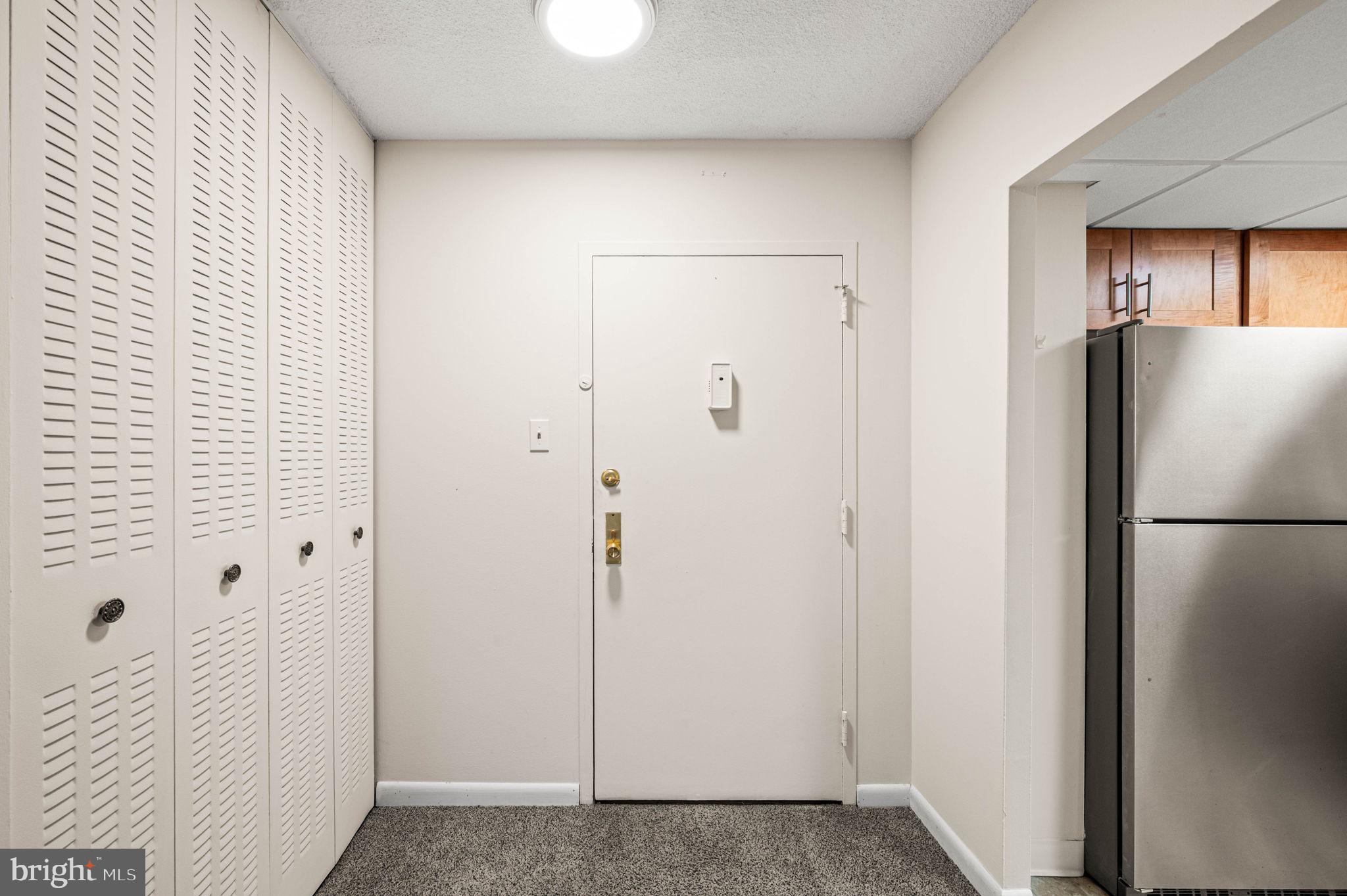 801 Yale Avenue, Unit 610 Swarthmore, PA 19081 - Photo 3 of 39 Foyer with a large coat closet.