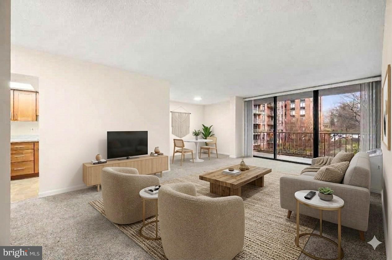 801 Yale Avenue, Unit 610 Swarthmore, PA 19081 - Photo 4 of 39 Living room and dining area virtually staged.