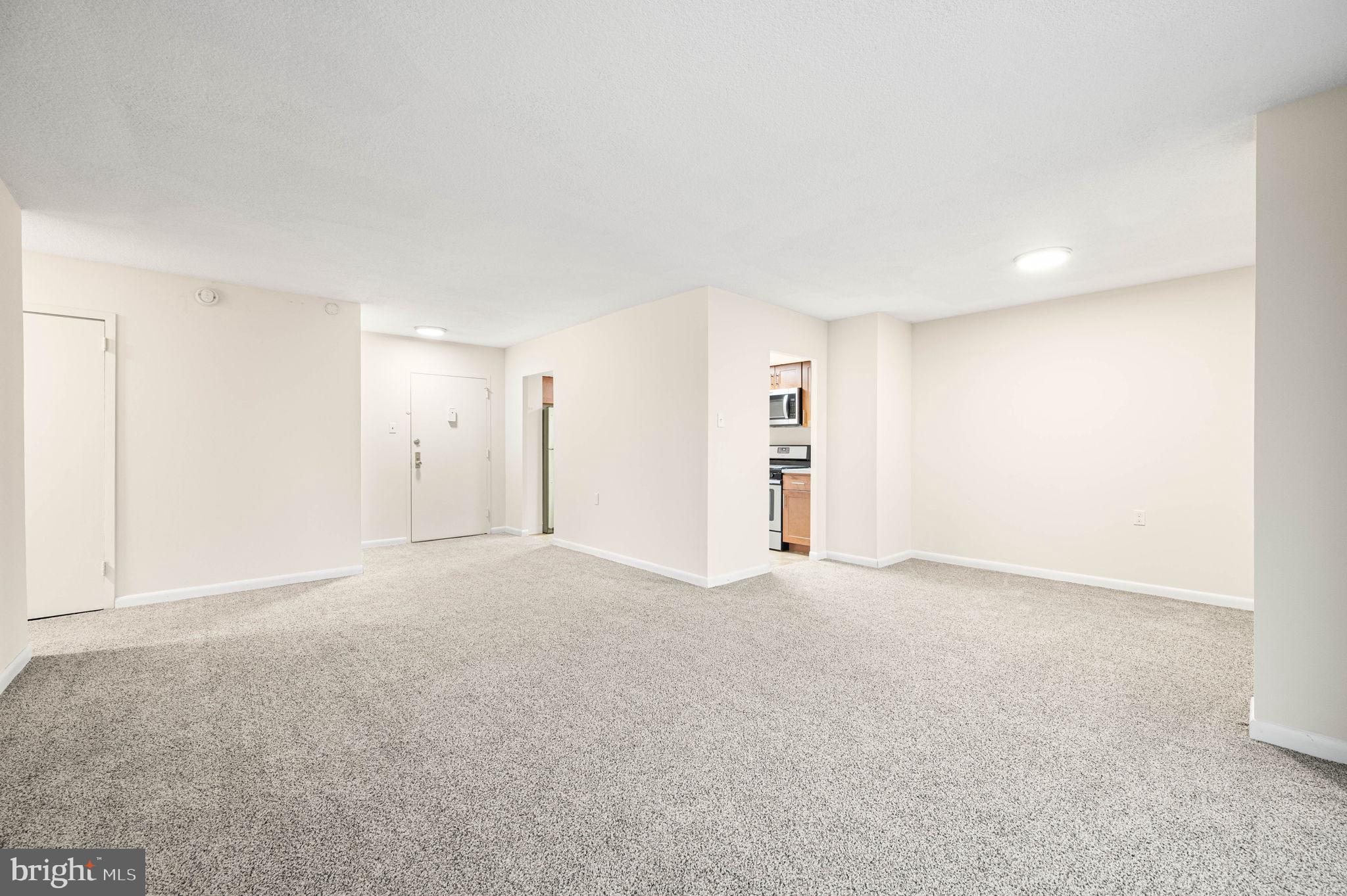 801 Yale Avenue, Unit 610 Swarthmore, PA 19081 - Photo 6 of 39 Living room and dining area looking into kitchen.