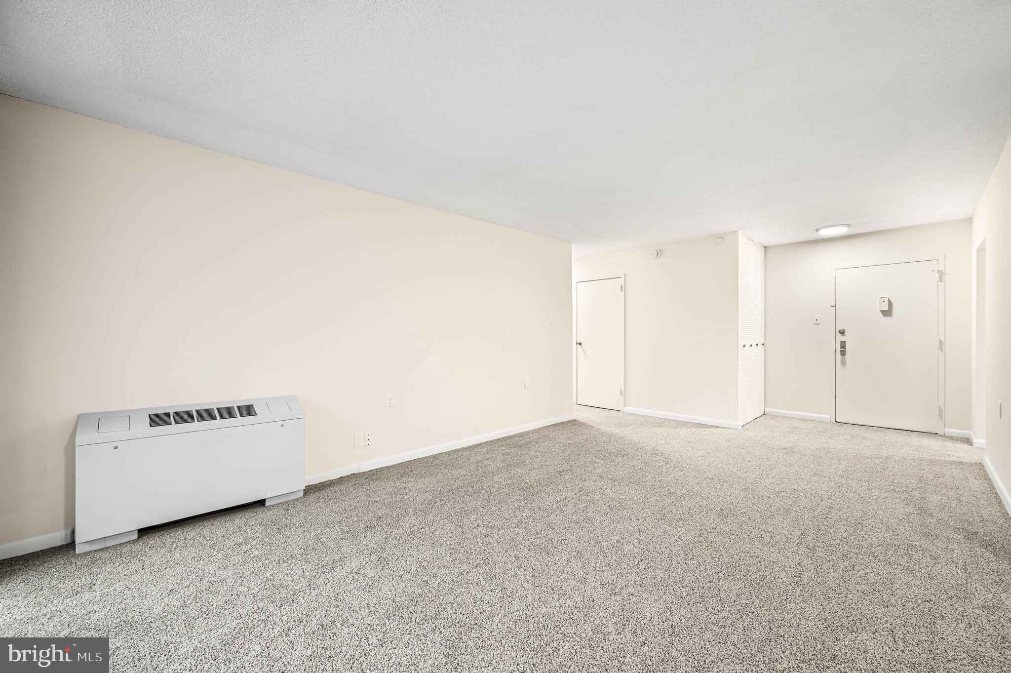 801 Yale Avenue, Unit 610 Swarthmore, PA 19081 - Photo 7 of 39 Living room and foyer.