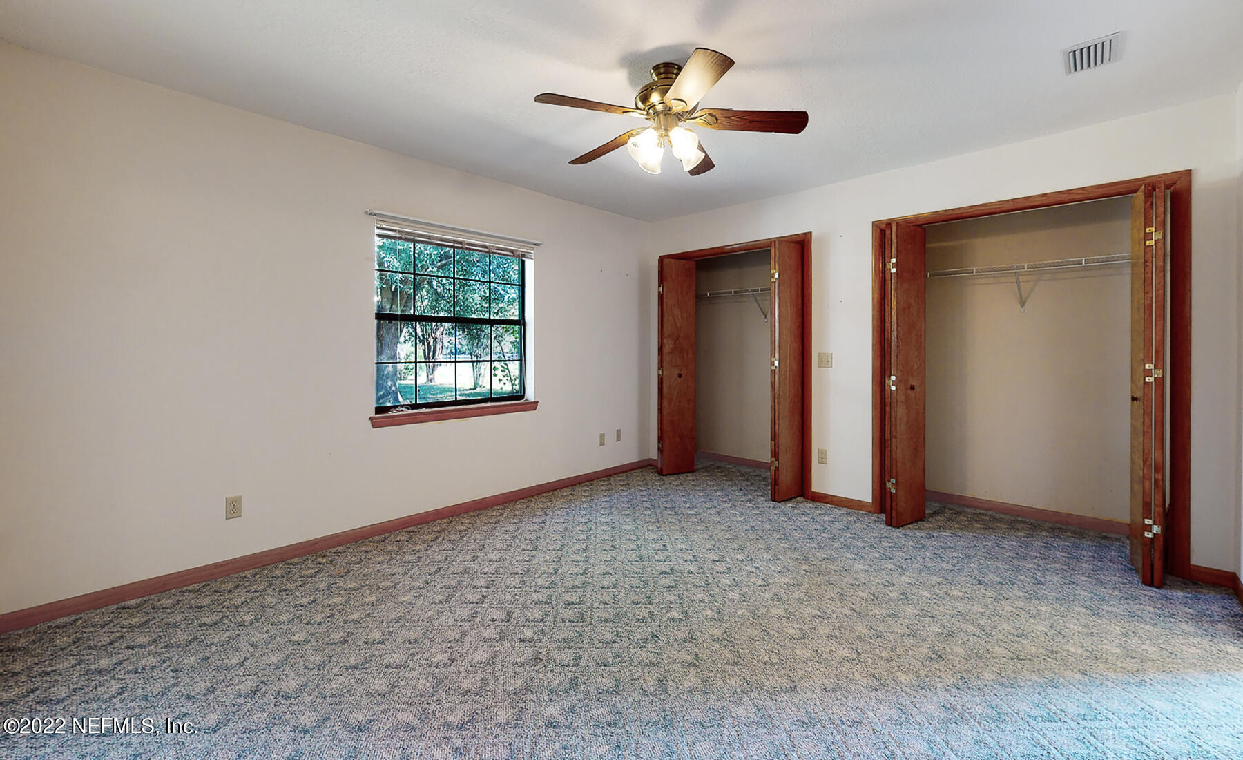 45918 Bismark Road Callahan, FL 32011 - Photo 17 of 45 a view of an empty room with a window