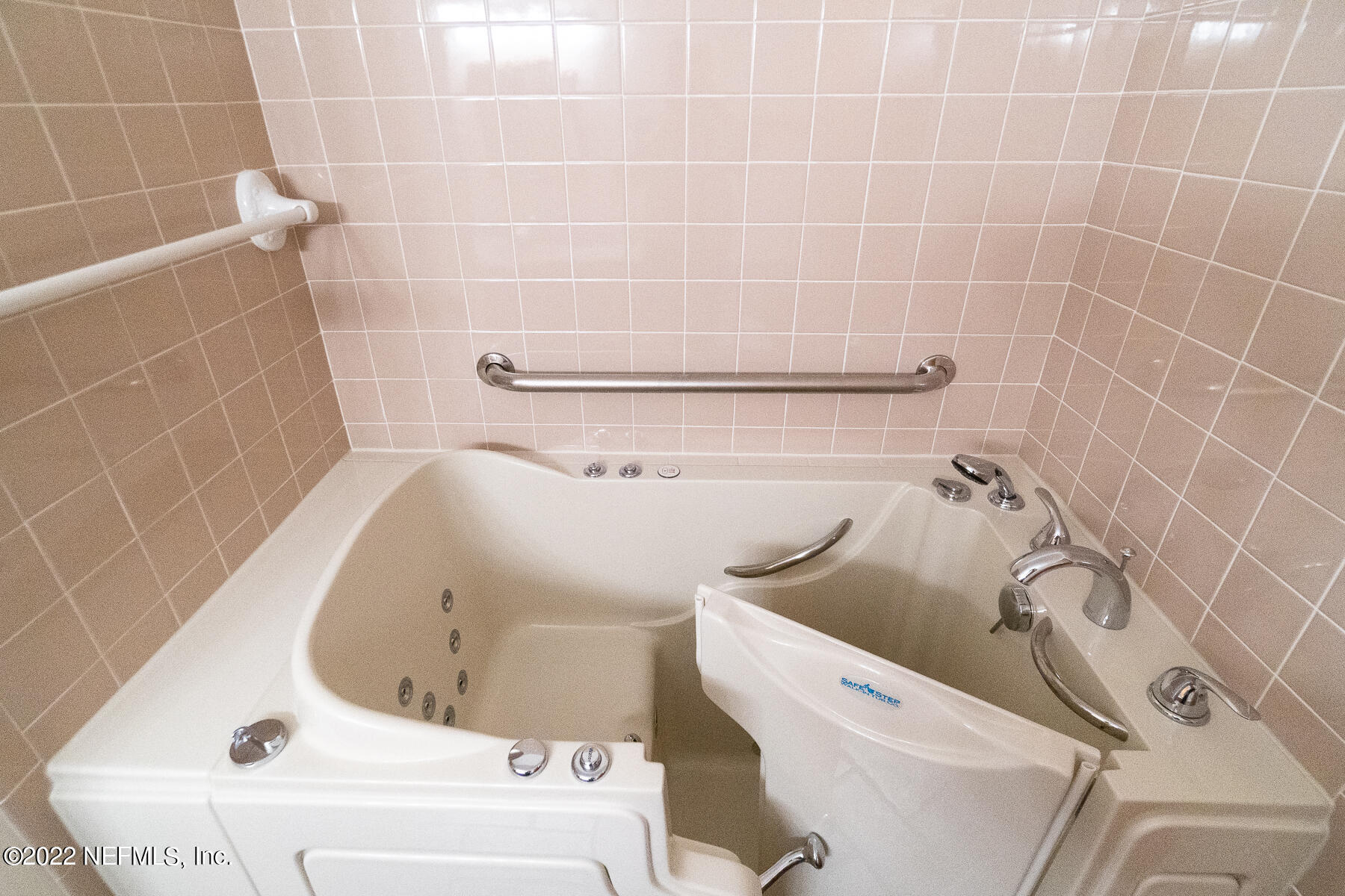 45918 Bismark Road Callahan, FL 32011 - Photo 20 of 45 a bathroom with a bathtub and shower