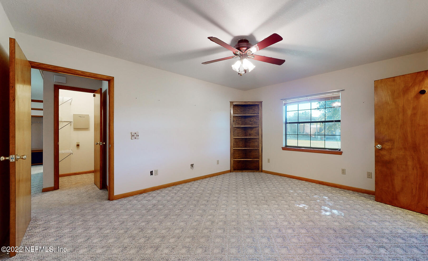 45918 Bismark Road Callahan, FL 32011 - Photo 23 of 45 an empty room with windows and fan